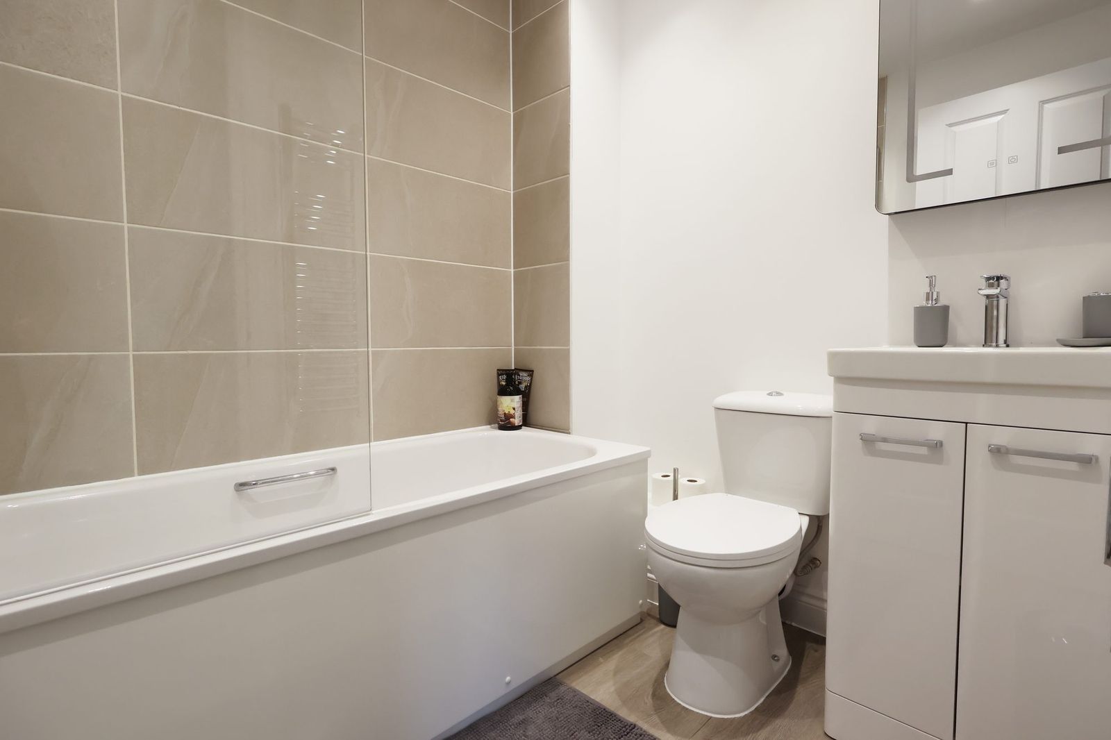 The shared bathroom — bath and shower