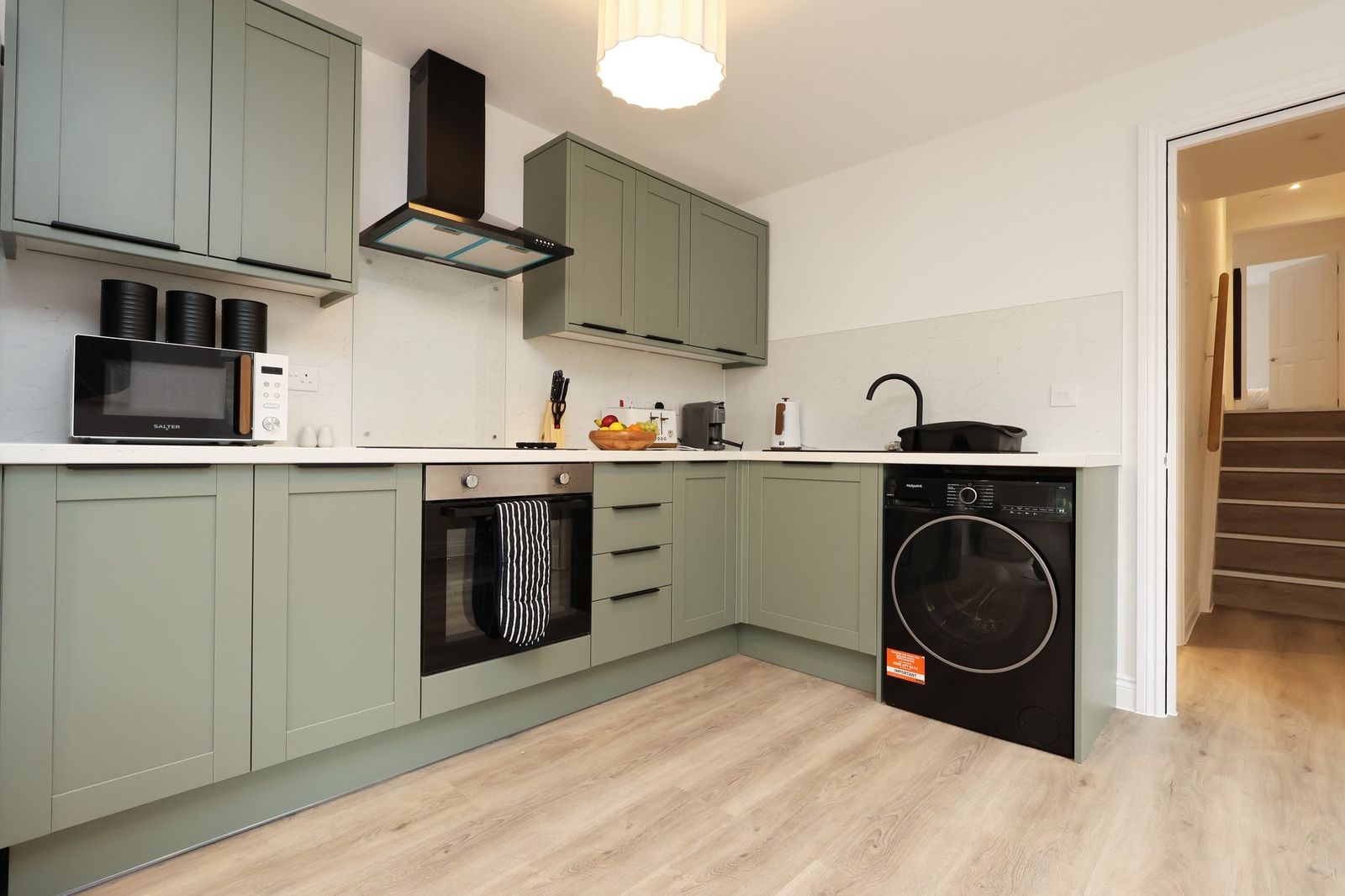 New kitchen with washing machine and dryer built in