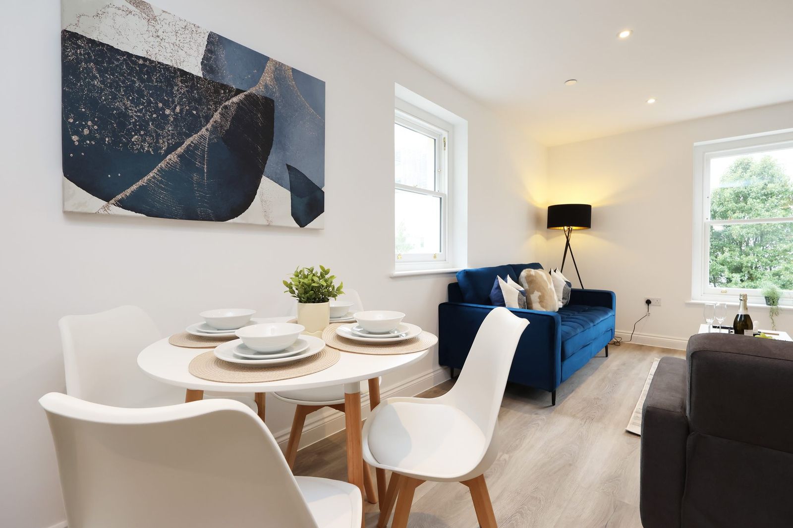 The dining table, with the sitting area beyond