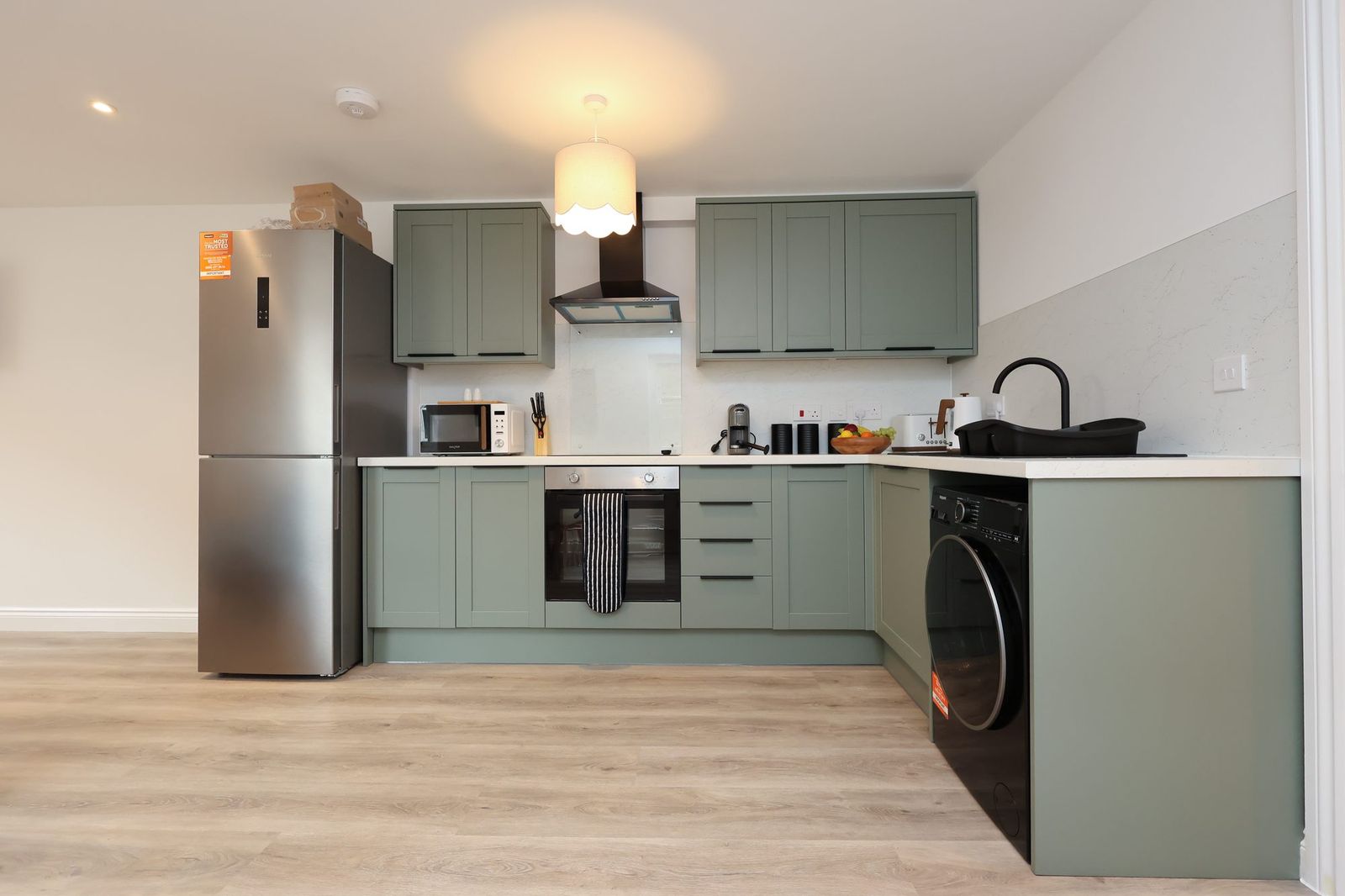 New kitchen with washing machine and dryer built in